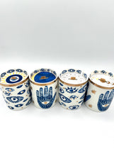 Load image into Gallery viewer, Beautiful Gold &amp; Blue White Ceramic Hamsa Scented Candle

