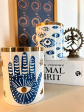 Load image into Gallery viewer, Beautiful Gold &amp; Blue White Ceramic Hamsa Scented Candle
