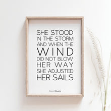 Load image into Gallery viewer, She stood in the storm and when the wind did not blow her away, she adjusted her sails inspirational wall art poster
